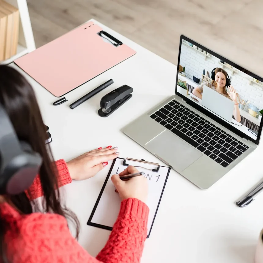 young-indian-woman-in-headphones-teaching-german-online